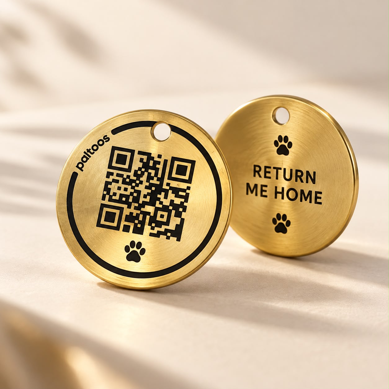 Paltoos Guardian QR Tag, brass pet ID tag with QR code on the front and 'Return Me Home' on the back