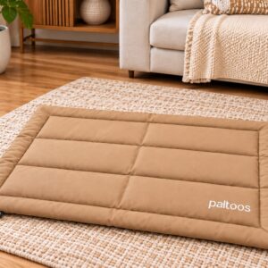 Paltoos Premium Travel Mat in Beige, quilted padded dog mat with carry handle in a living room